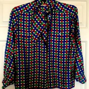 Vintage 1980 era silk YSL blouse. Size 38.